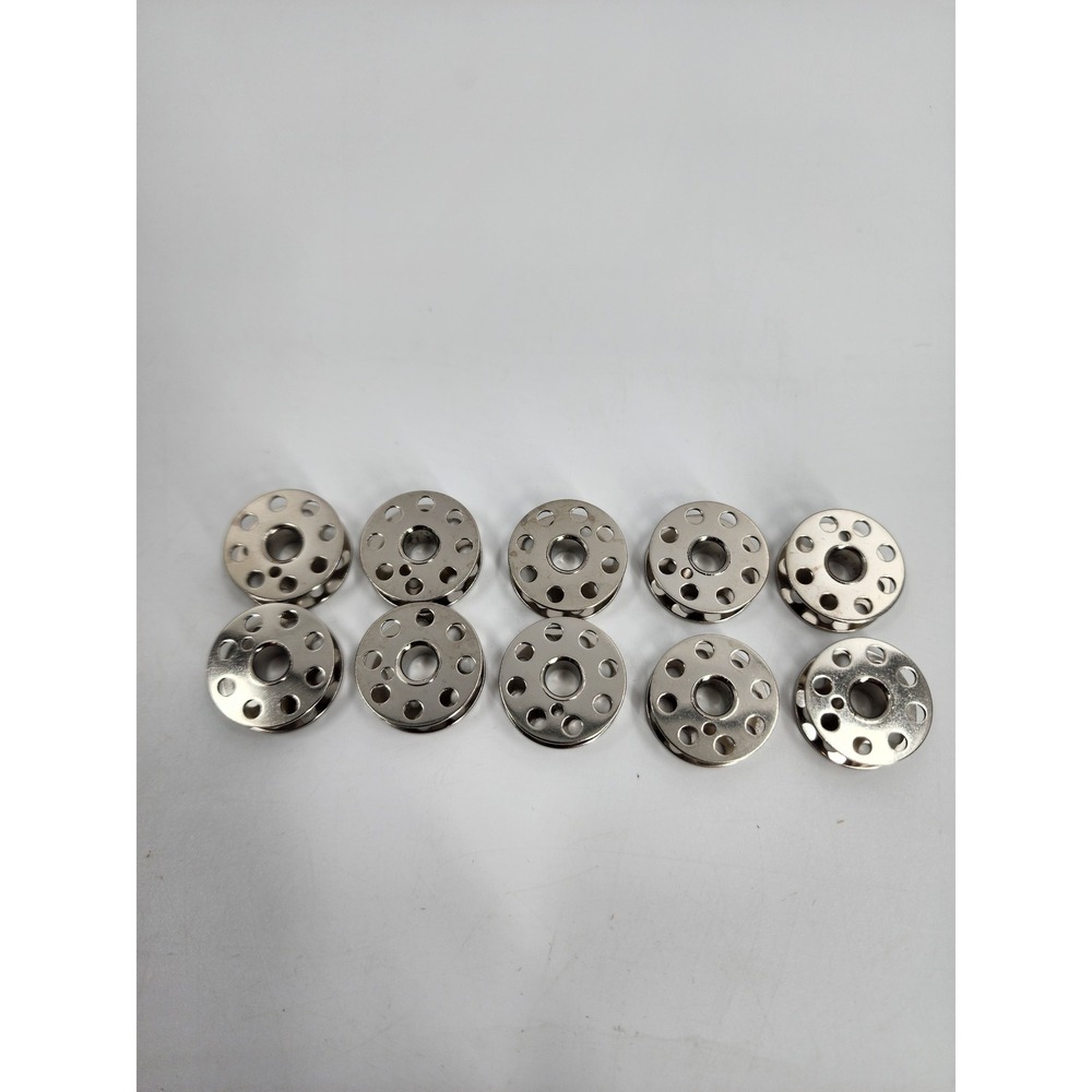 Lot of 10 Metal Sewing Machine Bobbins Silver Tone Universal Multi Hole Design